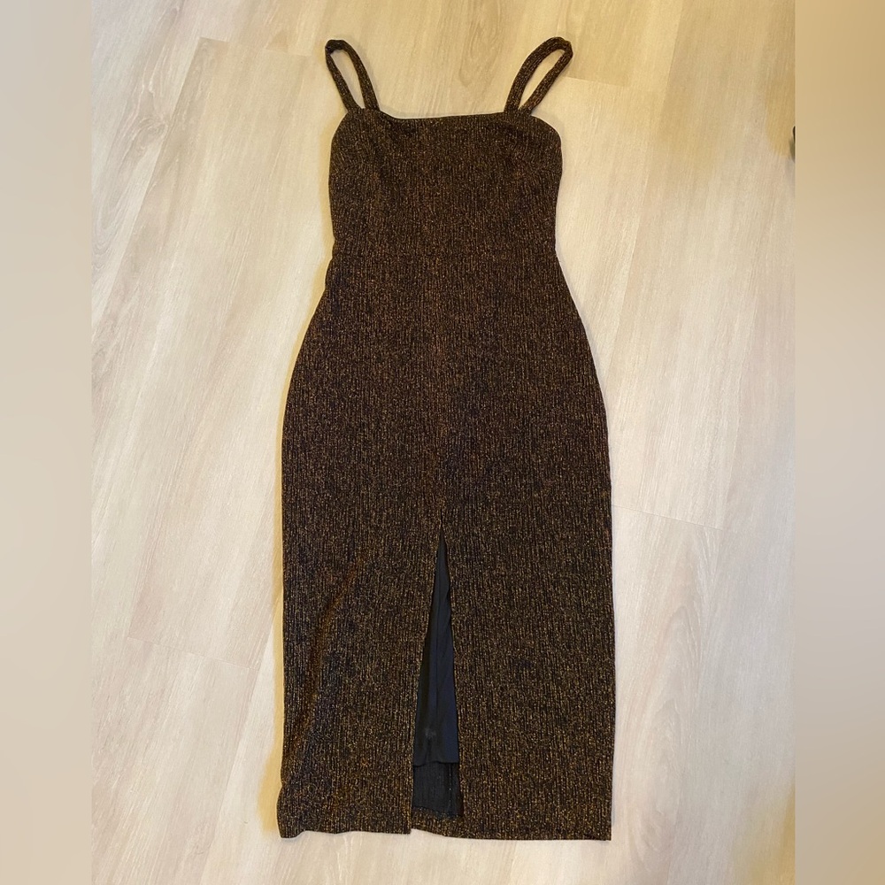 Fitted black and gold dress
